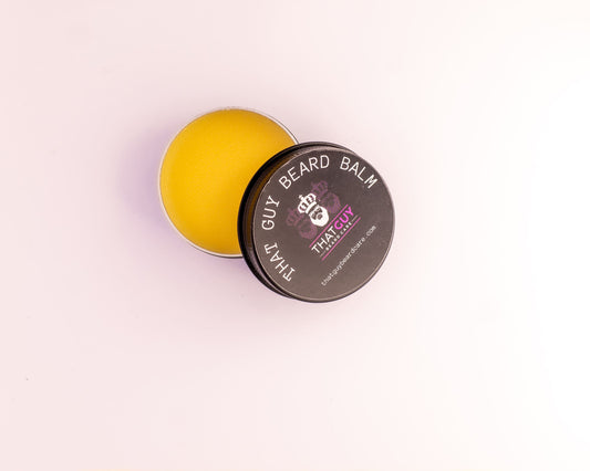 Smooth, creamy texture of handmade beard balm in tin