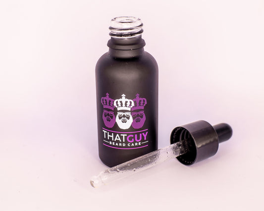 Beard oil dropper showing lightweight, natural oil texture